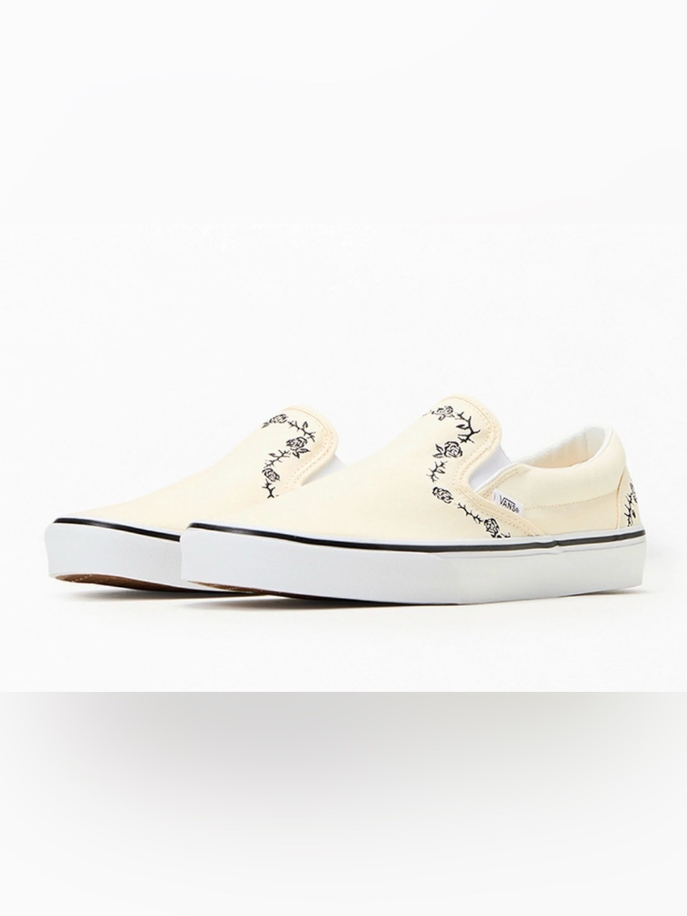 Vans Cream Slip-On Sneakers with Black Rose Embroidery